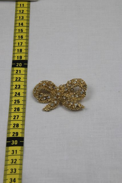 Broche noeud doré strass - photo 1